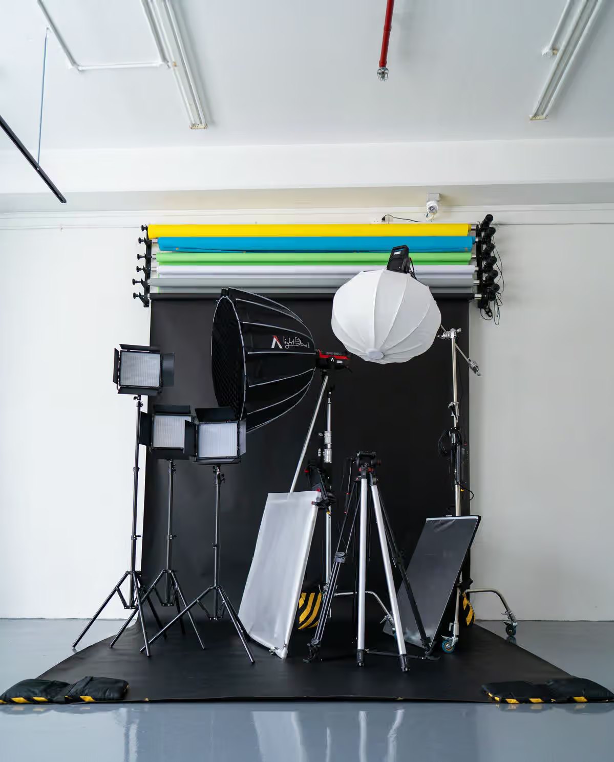 Photography studio set-up with lighting and backdrops — NxtCre8tives, Accra