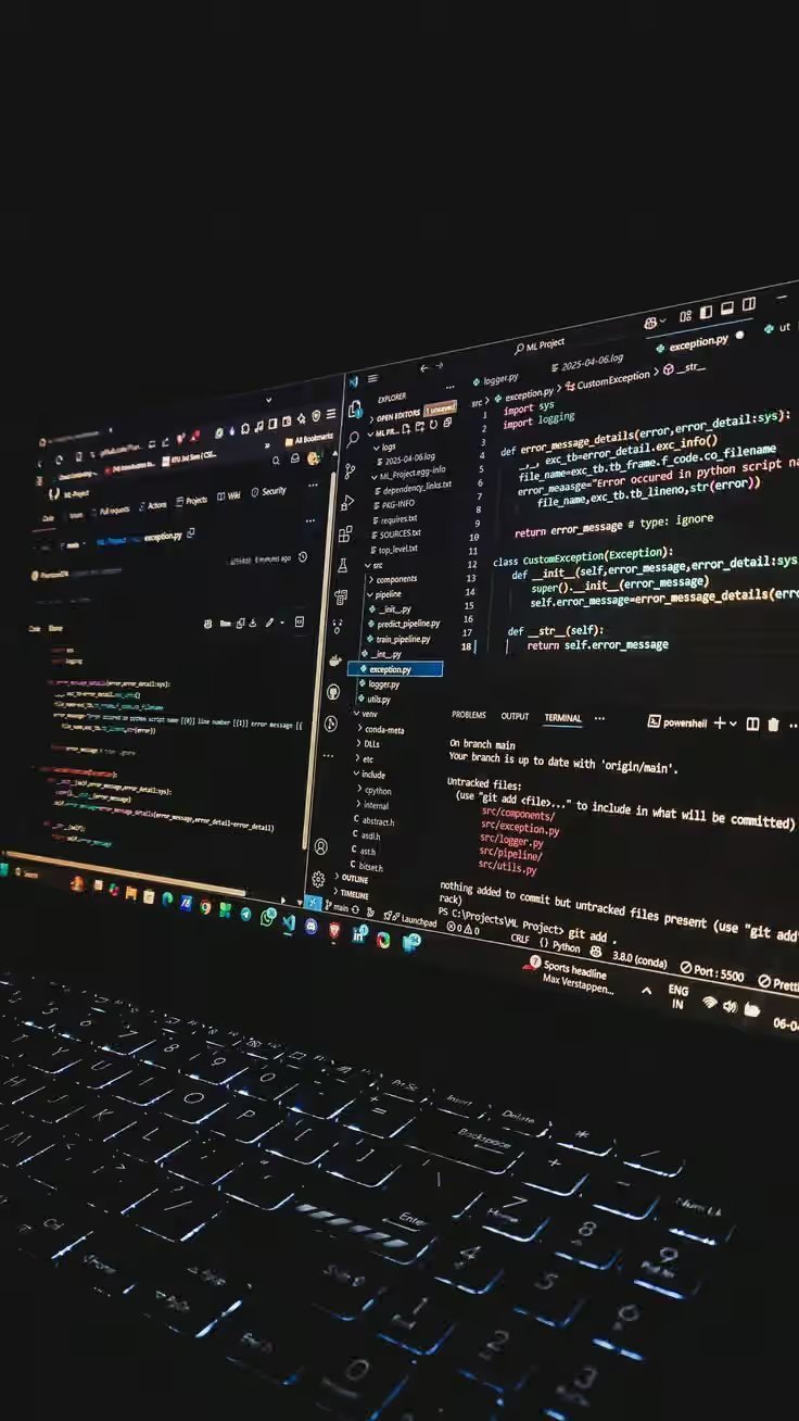 Code editor on screen during a web development build — NxtCre8tives, Accra